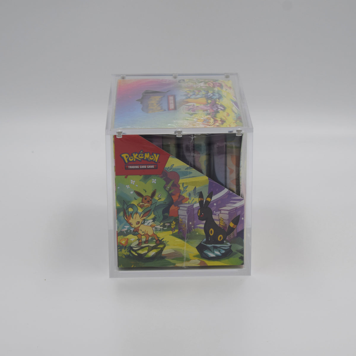 Acrylic case for a Pokémon Mini Tin 8-pack display, end view showing the tins through the display window