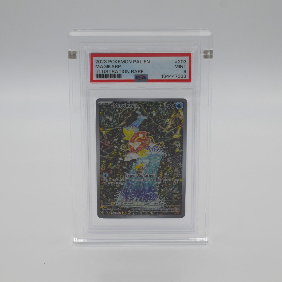 Acrylic display stand fitted to a PSA graded card slab