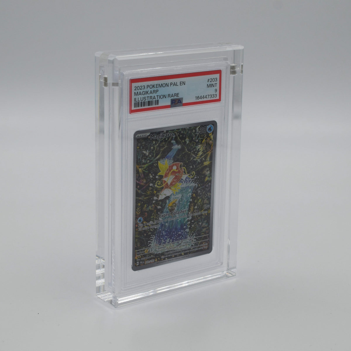 Graded card slab shown in a Foz Collectables acrylic display case