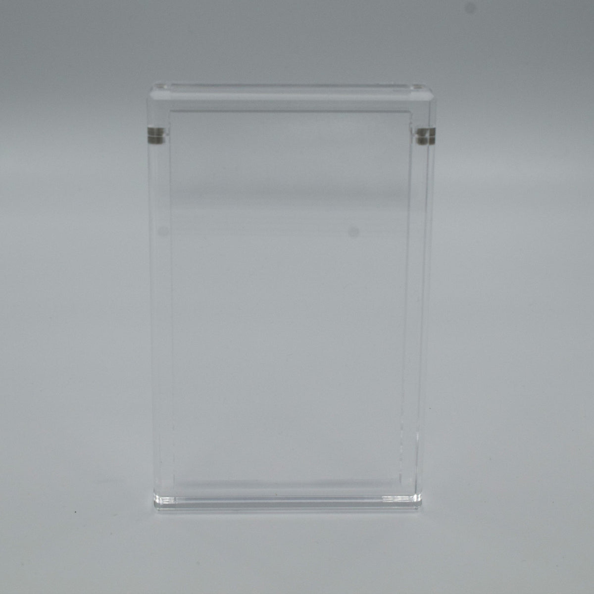 Graded Pokémon card displayed upright in a clear 5mm acrylic case