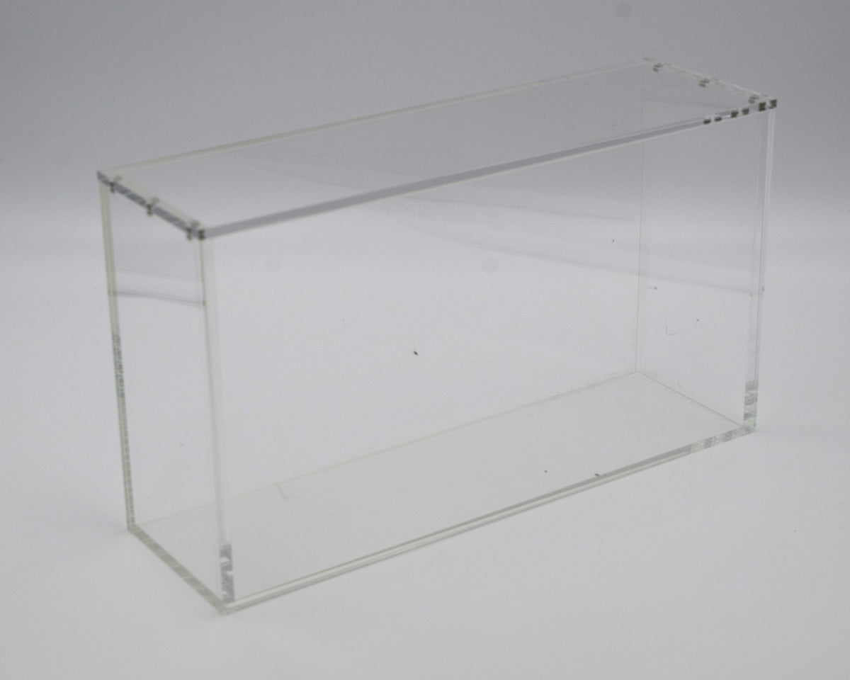 Acrylic case for a Pokémon Celebrations UPC, angled view