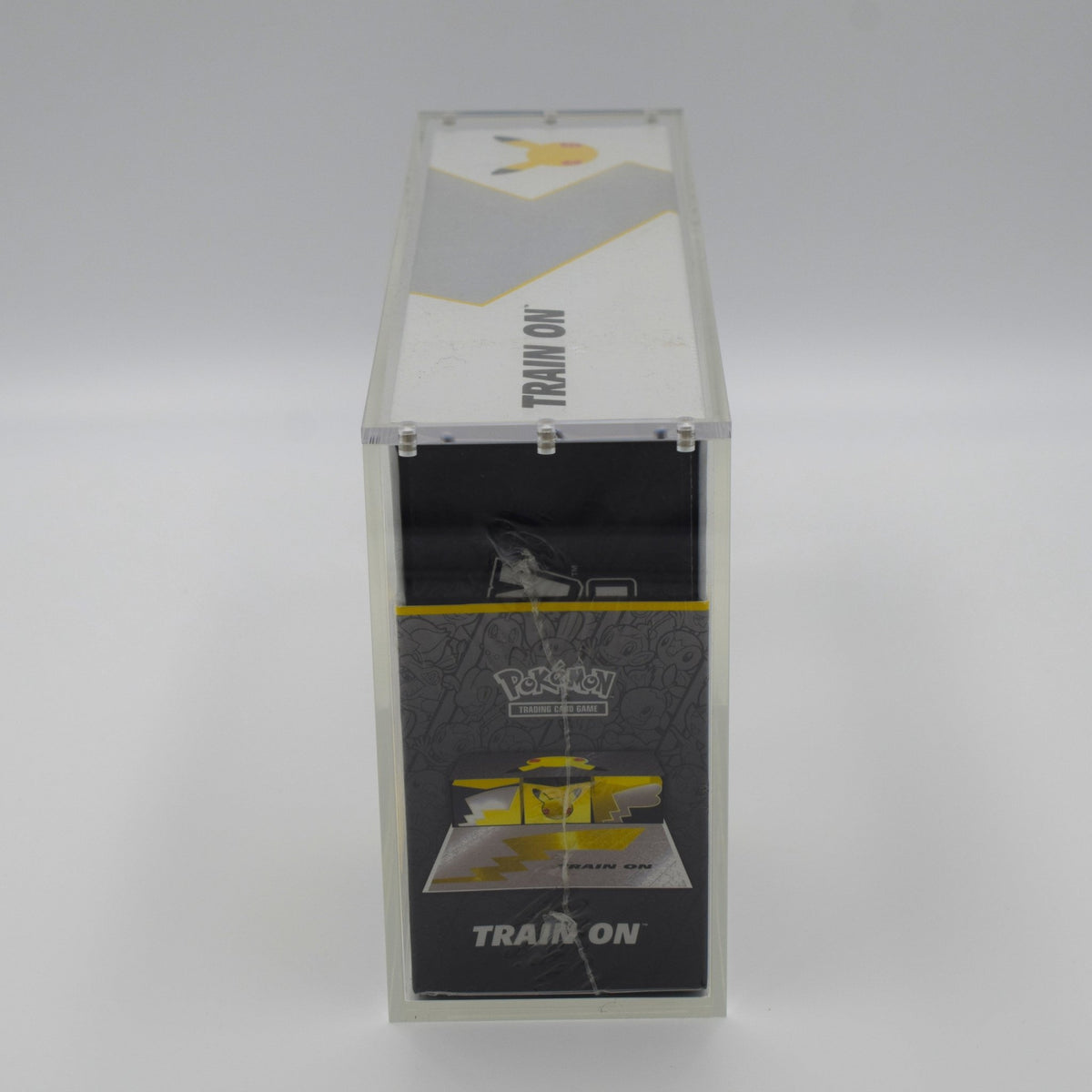 Acrylic case for a Pokémon Celebrations UPC, rear view
