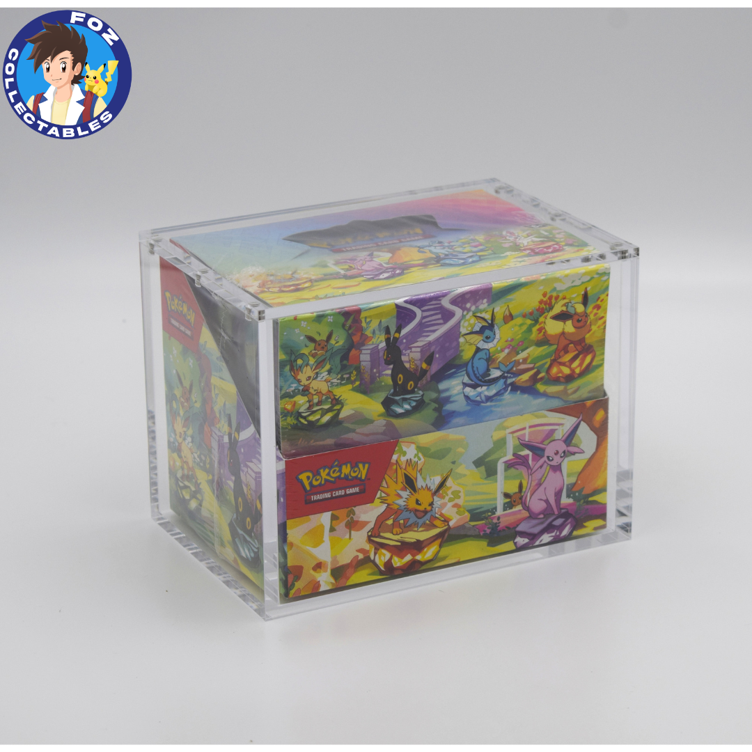 Acrylic case for a Pokémon Mini Tin 8-pack display, angled view with a Prismatic Evolutions mini tin display inside